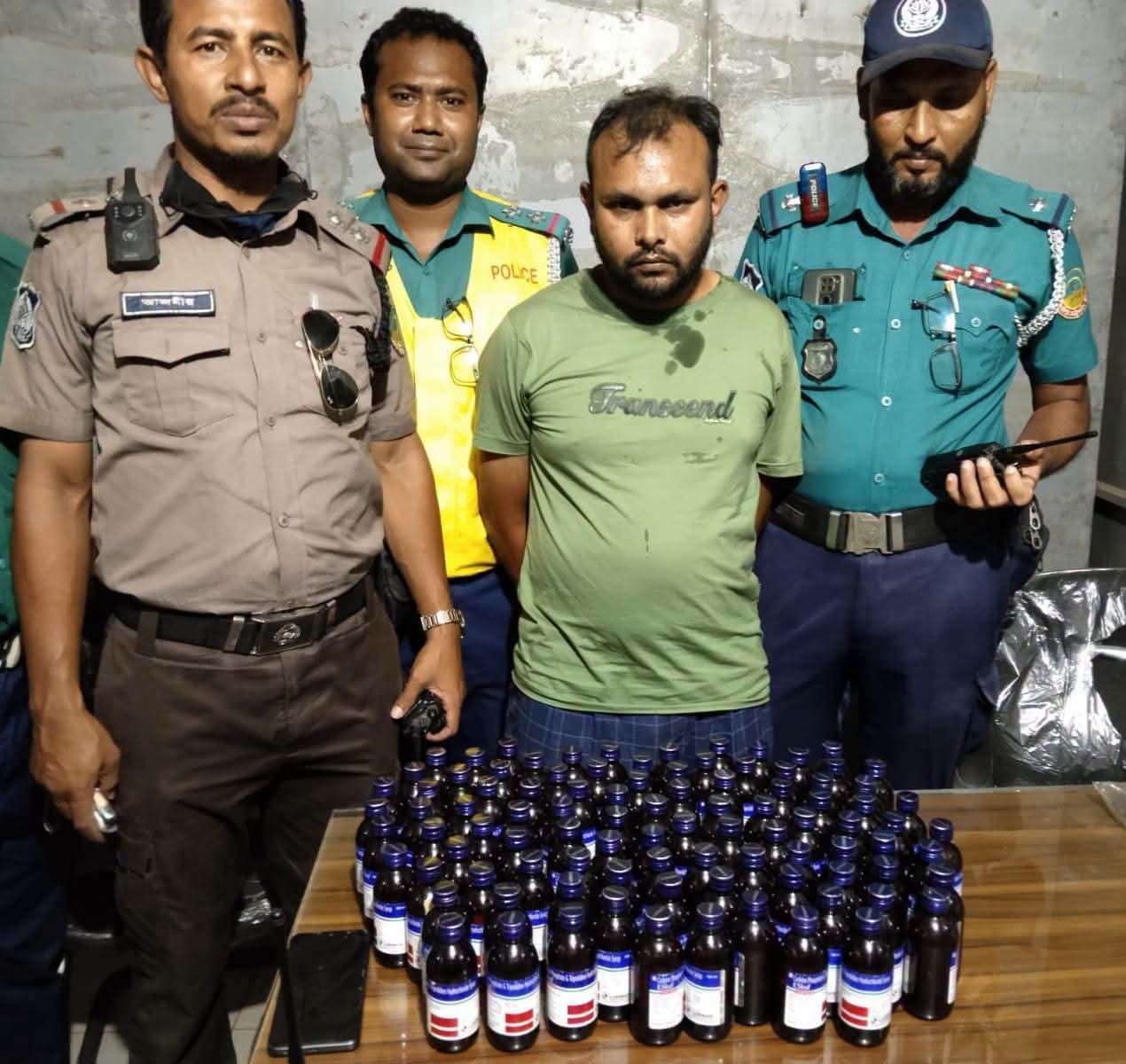 টঙ্গীতে অভিনব কায়দায় স্কুটির বক্সে ৯৬ বোতল ফে.ন.সি.ডি.ল পাচারকালে আ.ট.ক ১